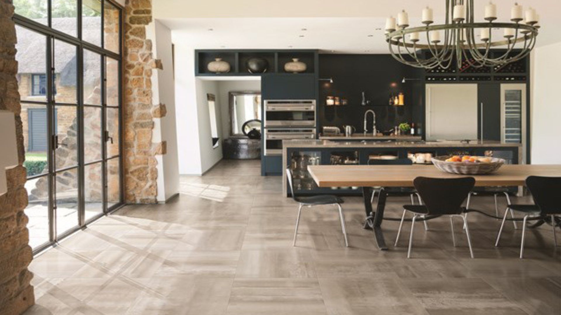 tile flooring in a large open kitchen and dining room